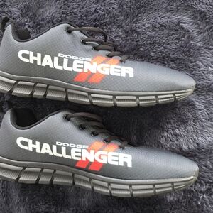 Black and Red Athletic Shoes with Sleek Design and Distinctive Sole